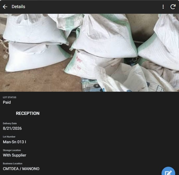 Platform screen showing a lot received on site: photograph of the bagged ore, lot number, delivery date and payment status